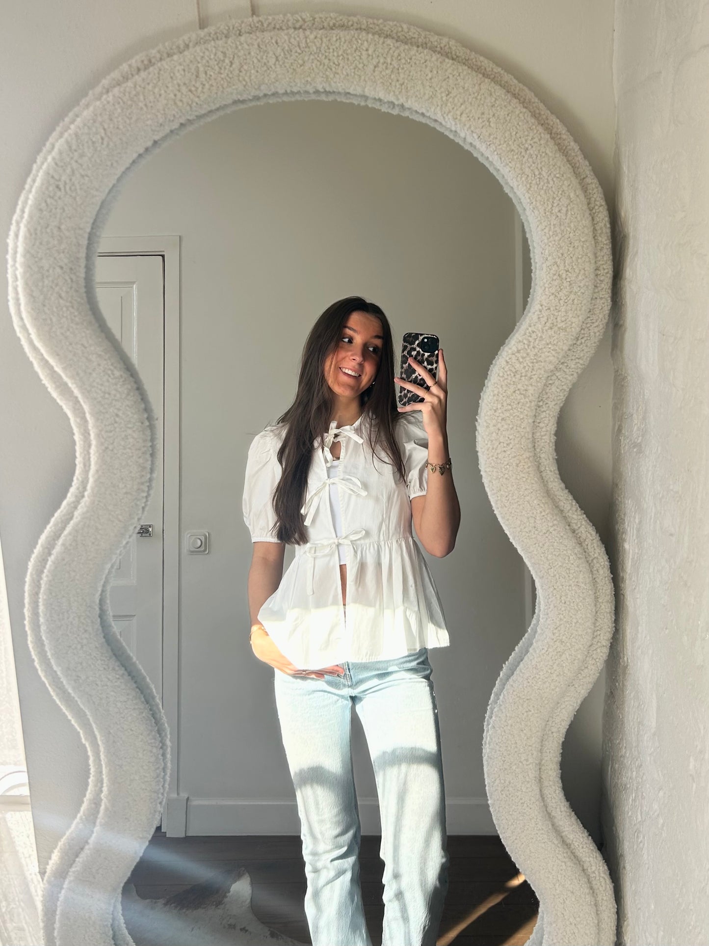 Peplum blouse met strikjes - wit